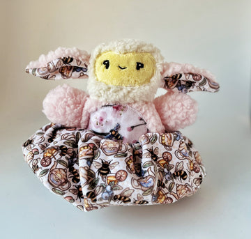 Bramble the lamb in “Bees and blossoms”